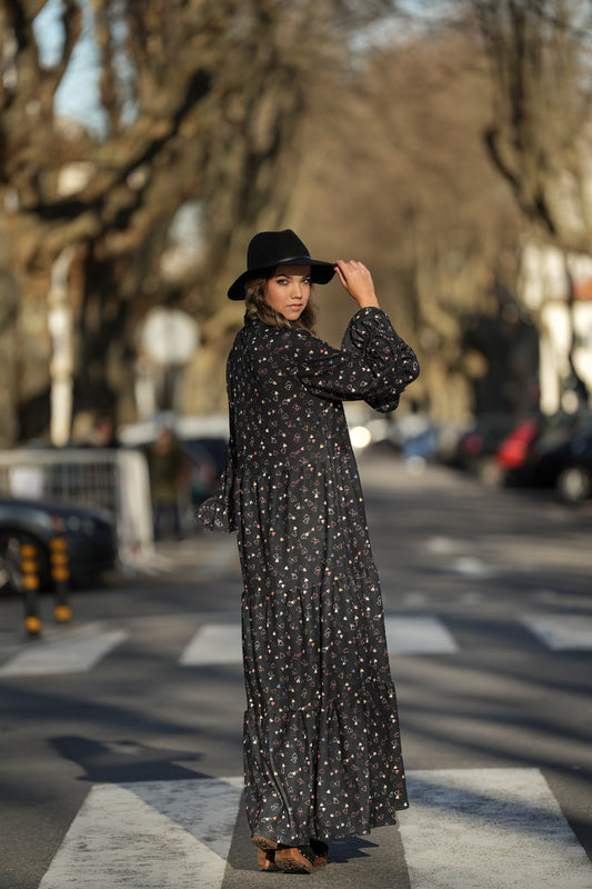 Dress with bow at the neckline