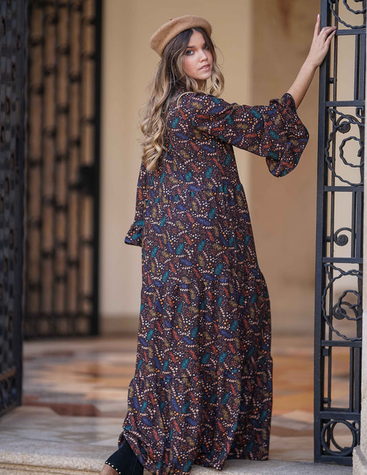 Dress with bow at the neckline