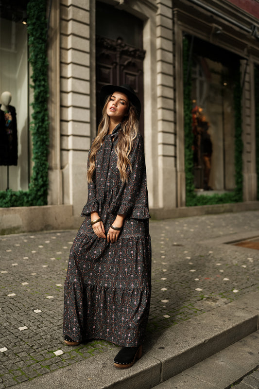 Dress with bow at the neckline