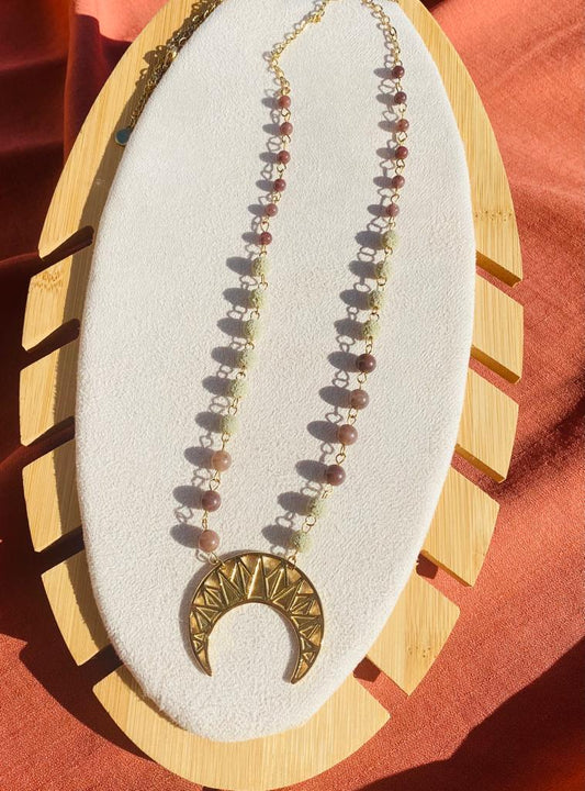 Necklace with half moon pendant